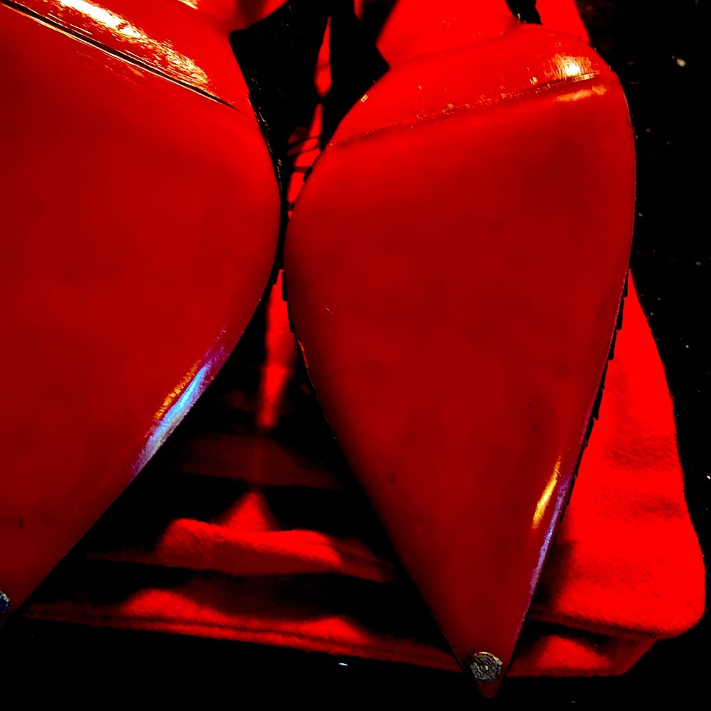 Black Christian Louboutin stilll look new have only worn a few times